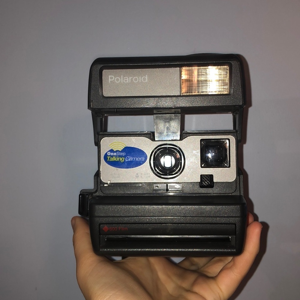 Polaroid Onestep Talking Camera.